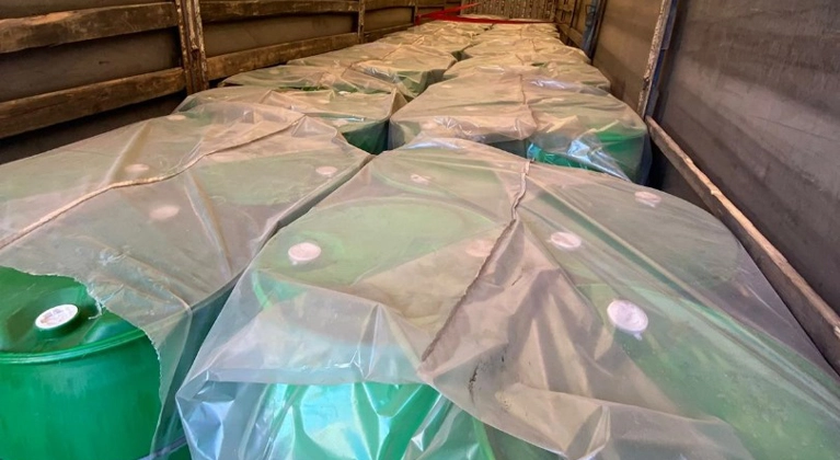 DEG in drum packing High-purity diethylene glycol (DEG) in an ISO tank, symbolizing reliable global supply for industrial chemical applications.