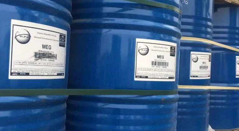 MEG future Clear, colorless mono ethylene glycol (MEG) liquid in a steel drum, highlighting its viscous texture for industrial chemical storage.