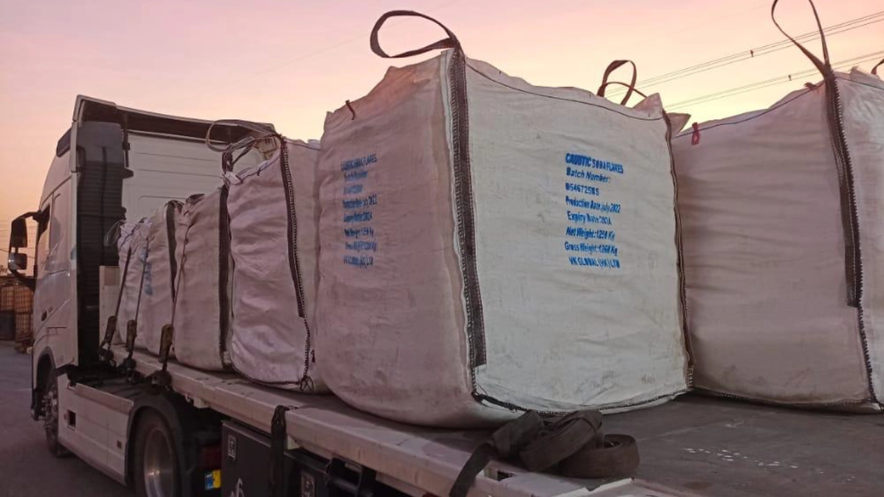 Caustic Soda in Kenya - Supplier showcasing NaOH flakes and pearls used in water treatment and textiles, delivered via the Port of Mombasa.