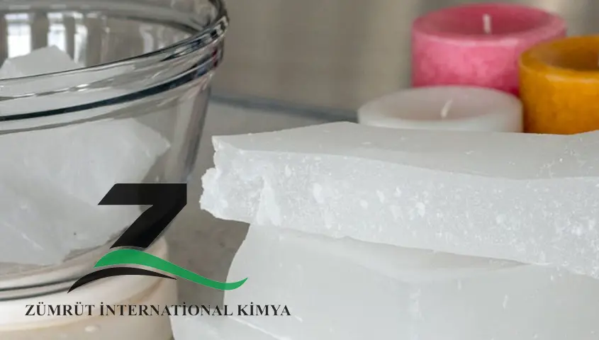 High-quality paraffin wax blocks stacked in a warehouse, supplied by ZÜMRÜT International Kimya Co., trusted supplier of paraffin wax in Croatia for industrial and commercial use.
